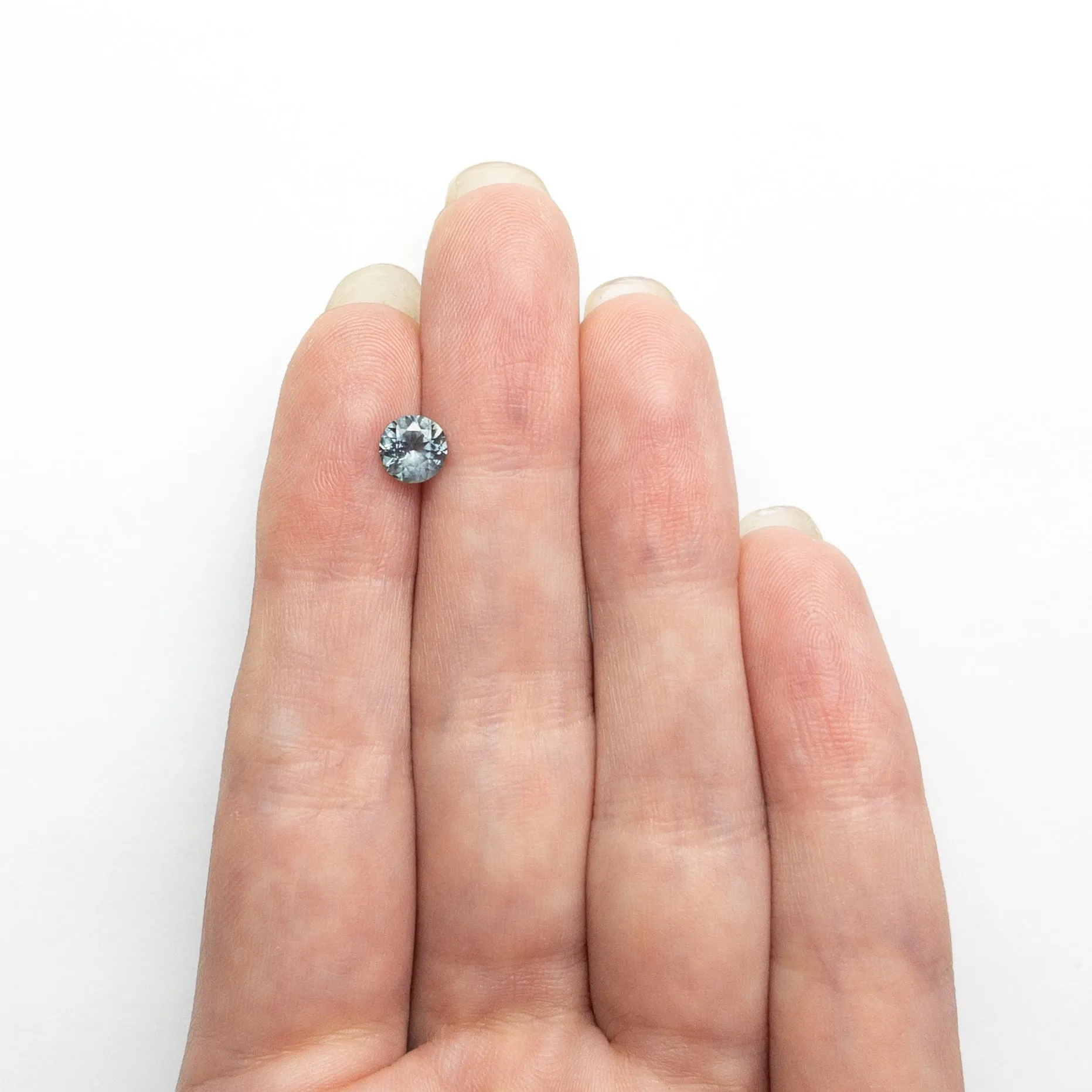 0.87ct 5.66x5.8x3.57mm Round Brilliant Sapphire 19940-19