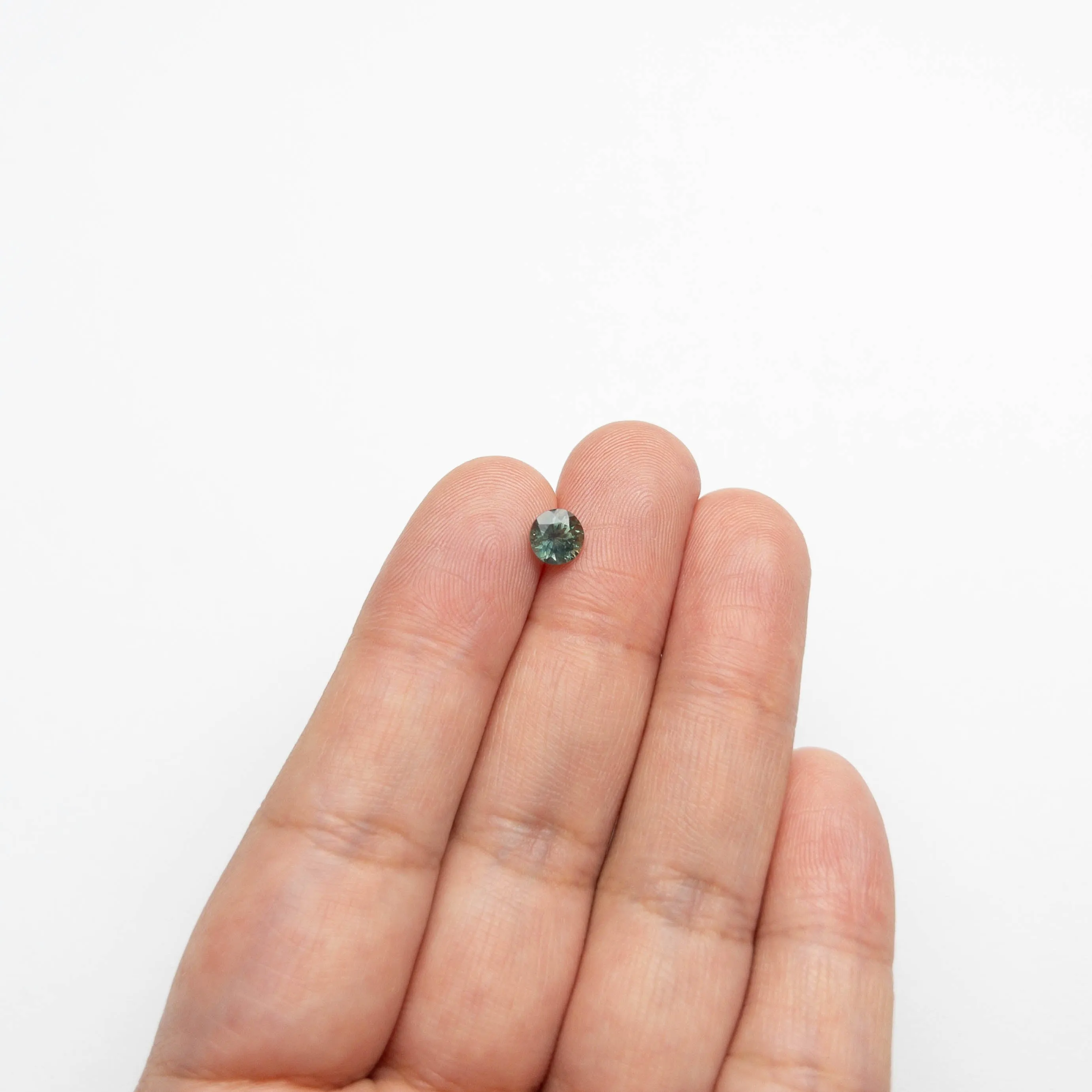 0.93ct 5.58x5.52x4.01mm Round Brilliant Sapphire 19940-05