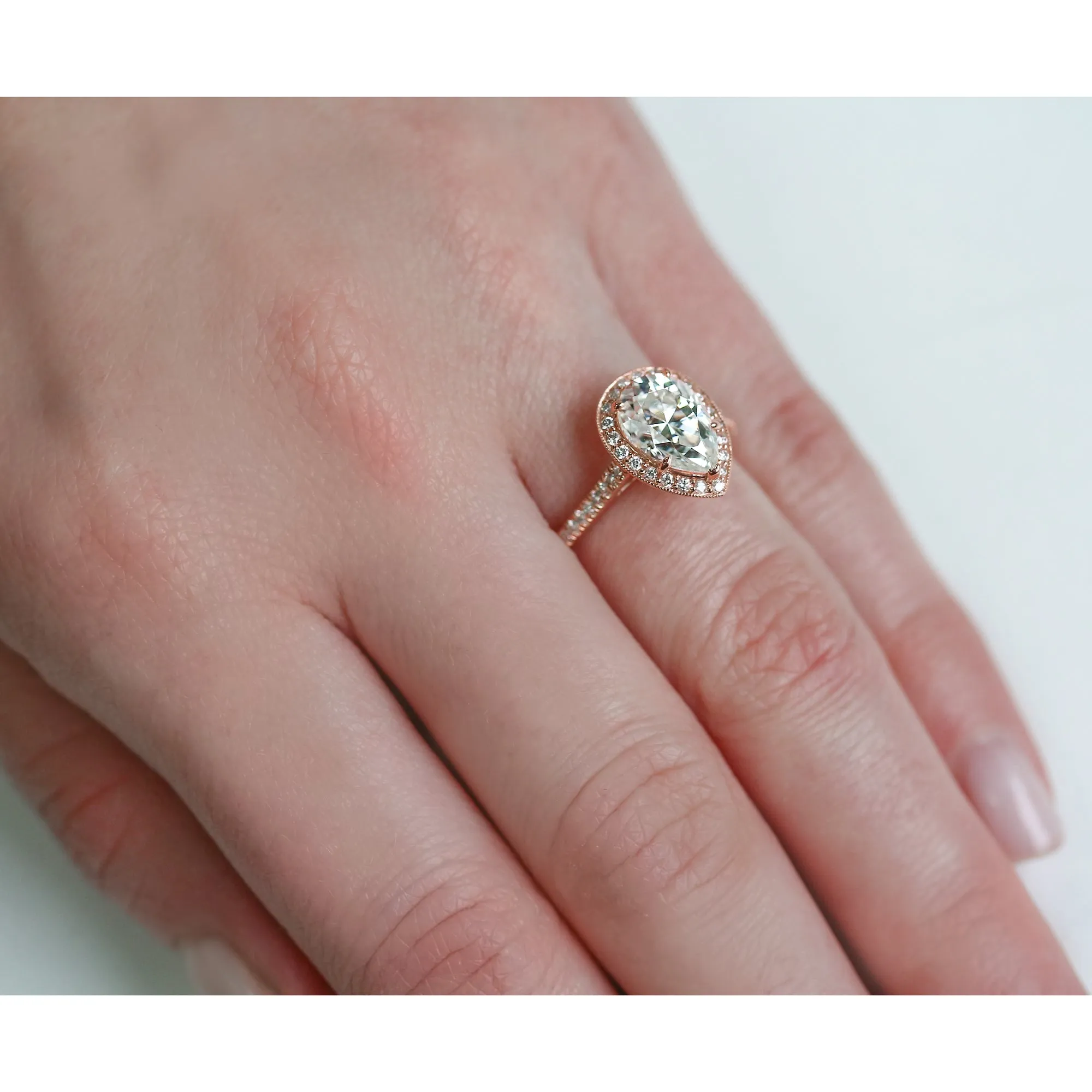 10x7 Pear Moissanite and Diamond Halo, 2-1/2ct.tw